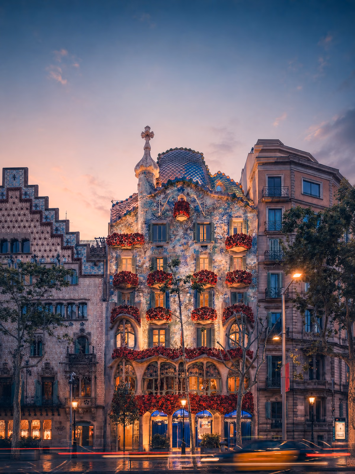 Casa Batlló illuminated at blue hour with no recognisable faces visible