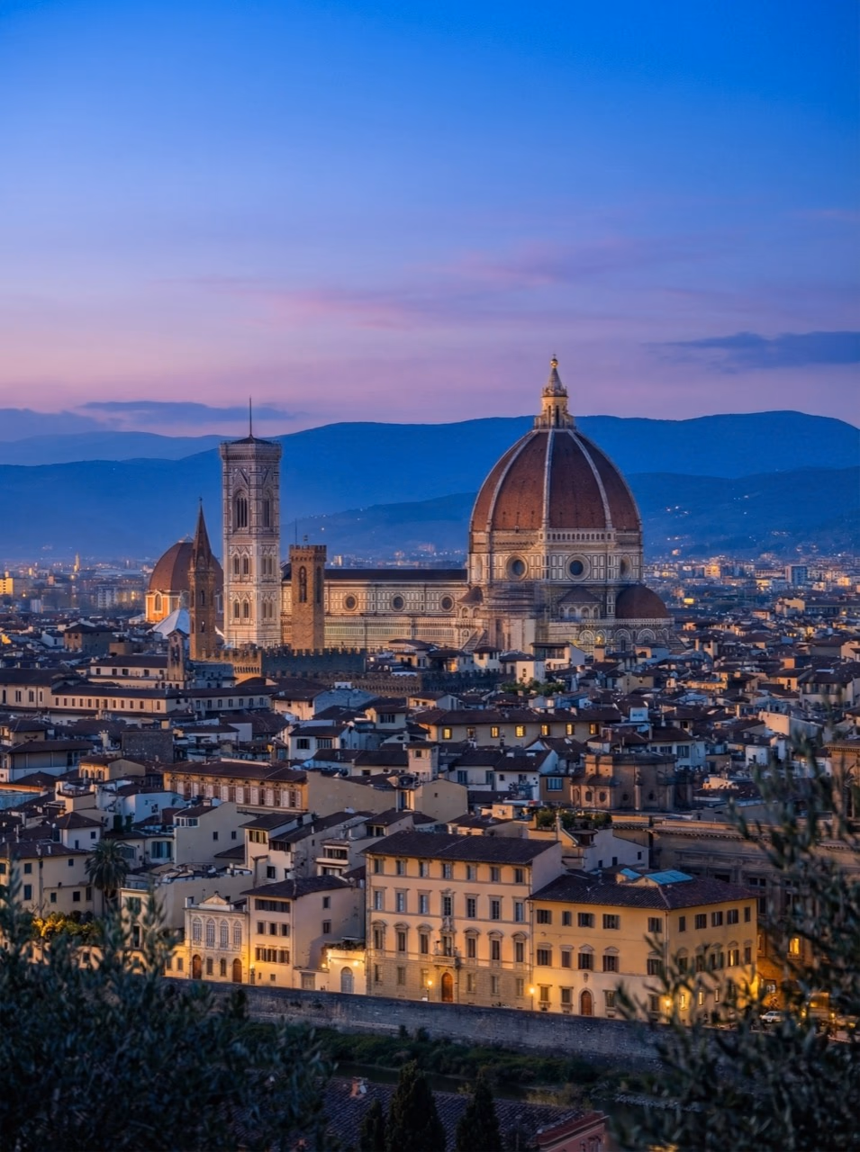 Florence Cathedral and city rooftops during blue hour