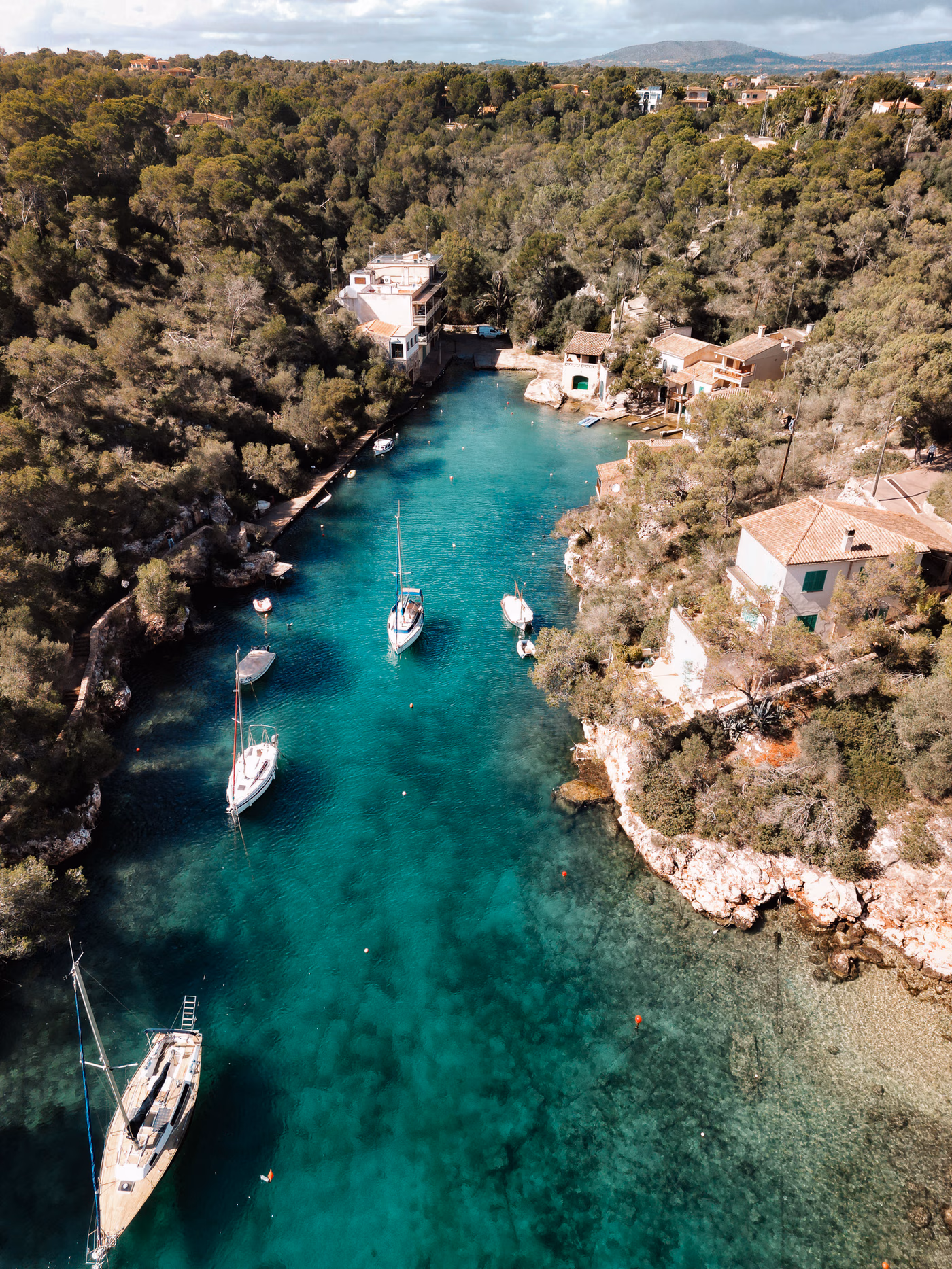 An aerial view of a secluded Mallorca cove with no people visible