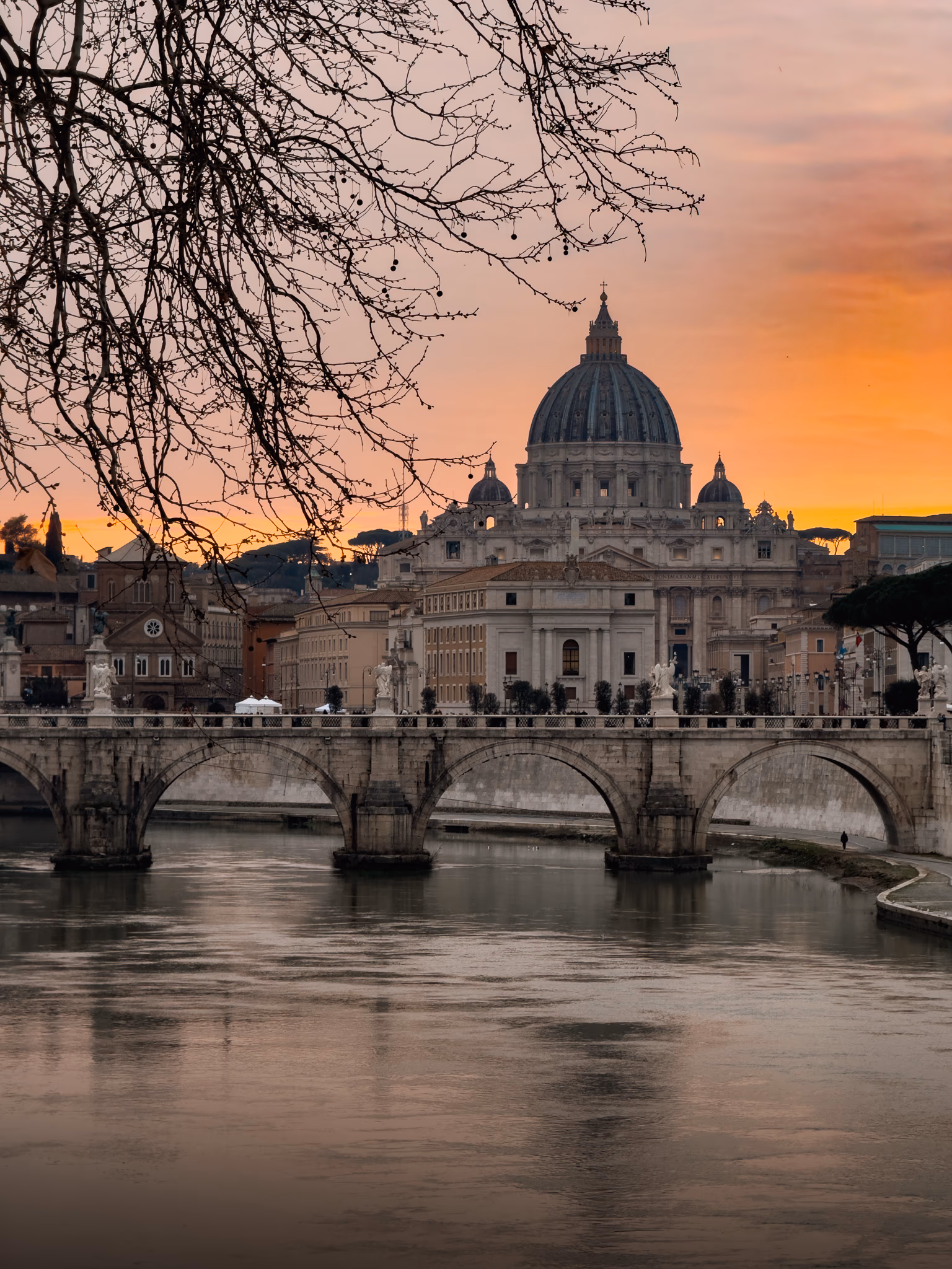 St Peter’s Basilica and the Vatican skyline under soft sunset light